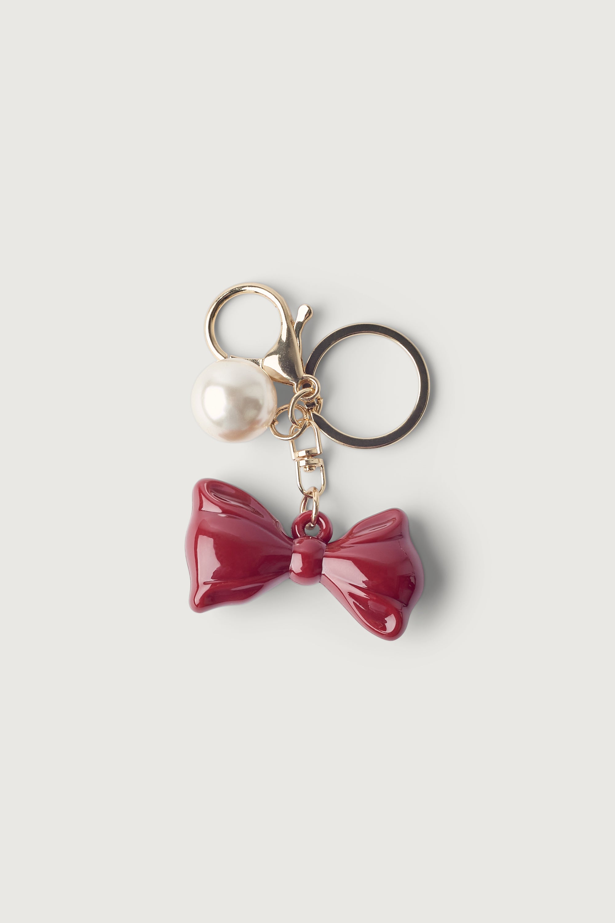 BOW AND PEARL BAG CHARM Cheap Pice Wholesale