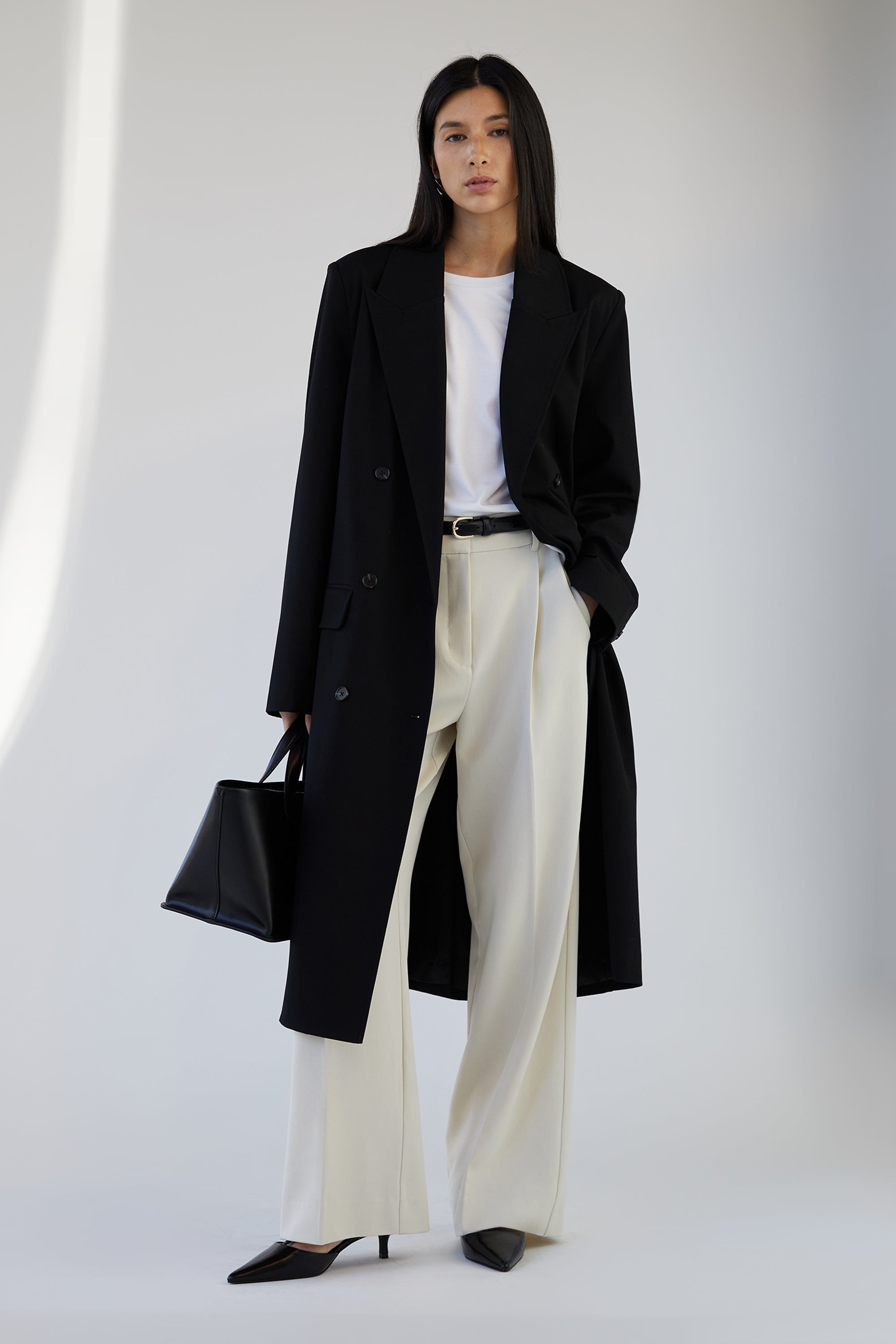DOUBLE-BREASTED SUITING COAT Visit New