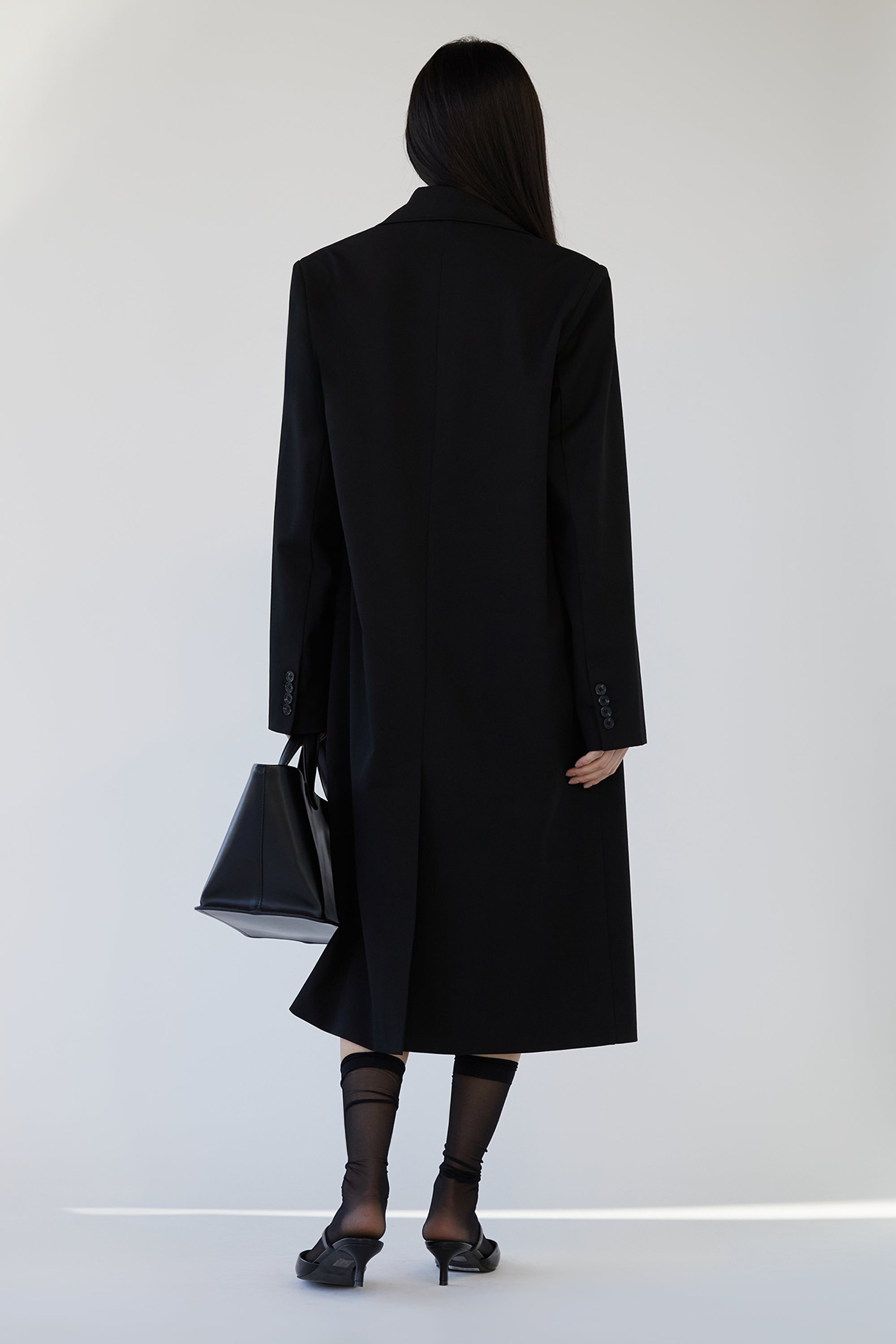 DOUBLE-BREASTED SUITING COAT Visit New