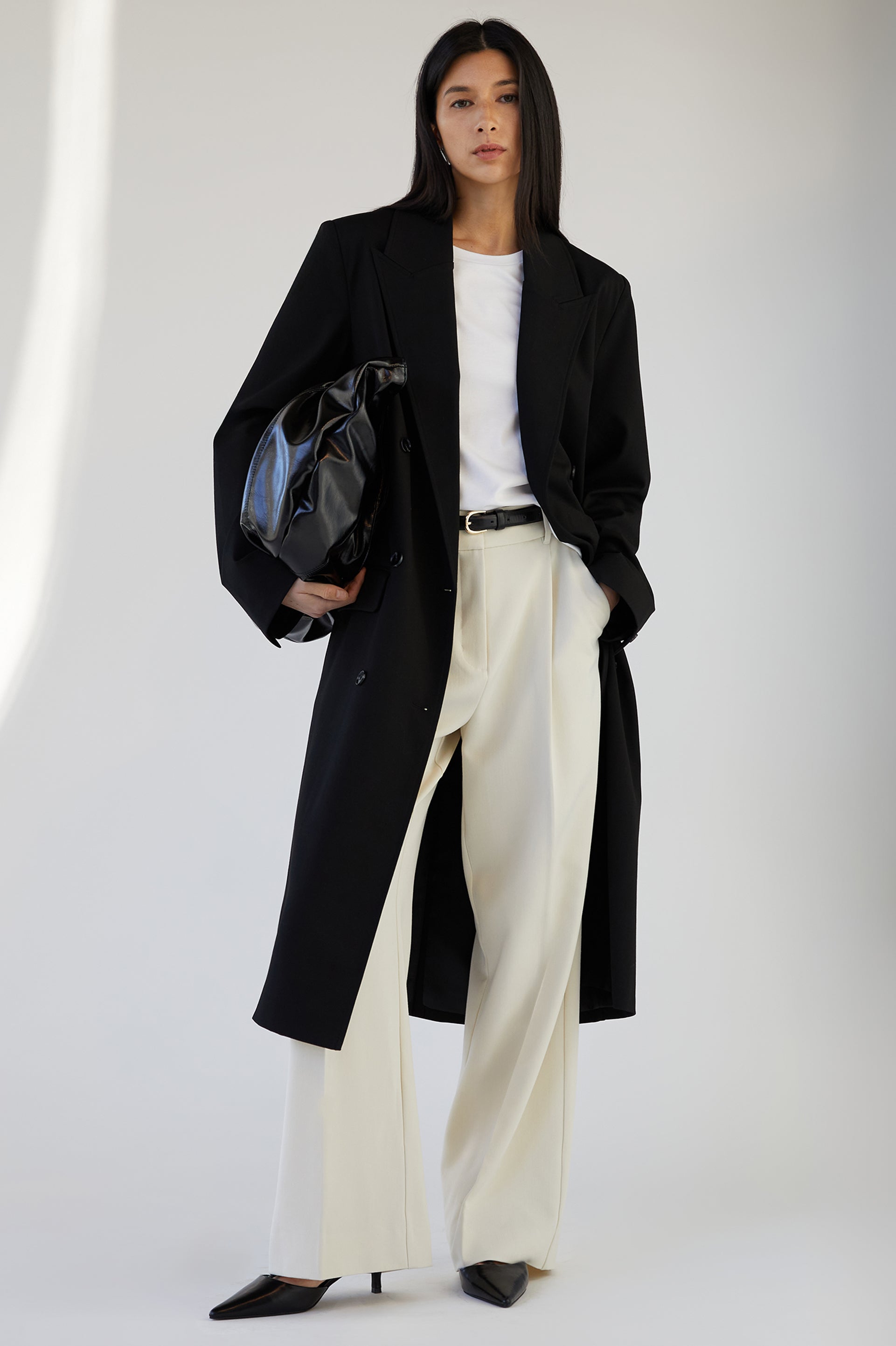 DOUBLE-BREASTED SUITING COAT Visit New